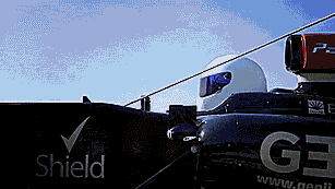 guy goes bungie jumping inside an f1 race care