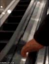 man holds hand going down escalator, wtf, creepy