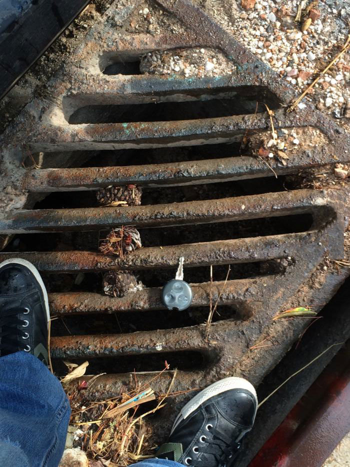 the day my heart stopped beating, car key on sewer grate