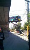 bus saved from falling off an overpass by a very dangerous set of wires