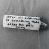 we are all addicted to something that takes away the pain, writing on a lighter
