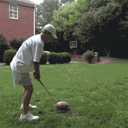 a perfect golf shot of a football into a basketball net