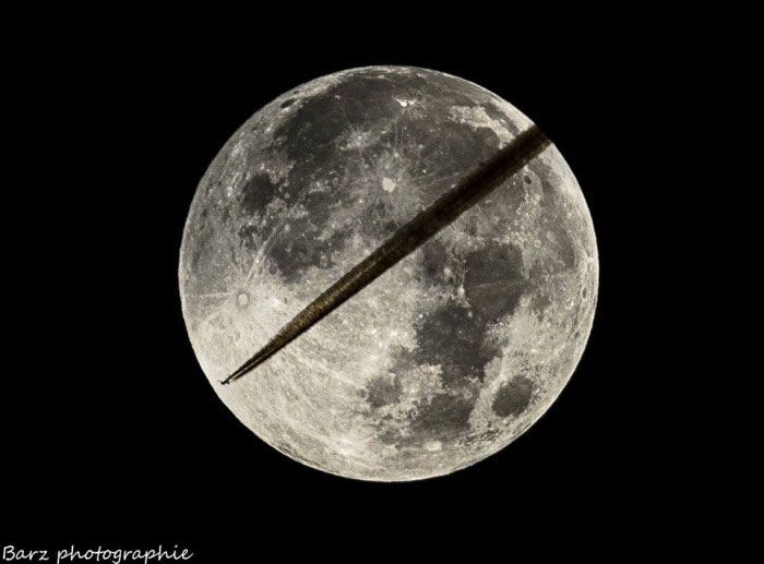 he was preparing for shooting the lunar eclipse when a plane came by