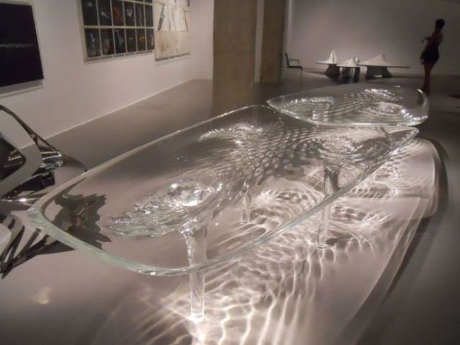really trippy upwards water effect glass coffee table