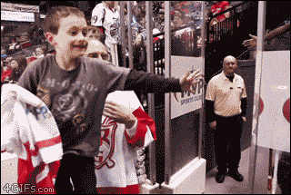 little kid gets hockey stick and is the image of pure happiness after, what's up buddy, tootoo