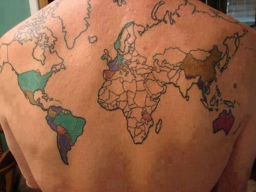 a tattoo of a map of the world, i color in the country when i visit it