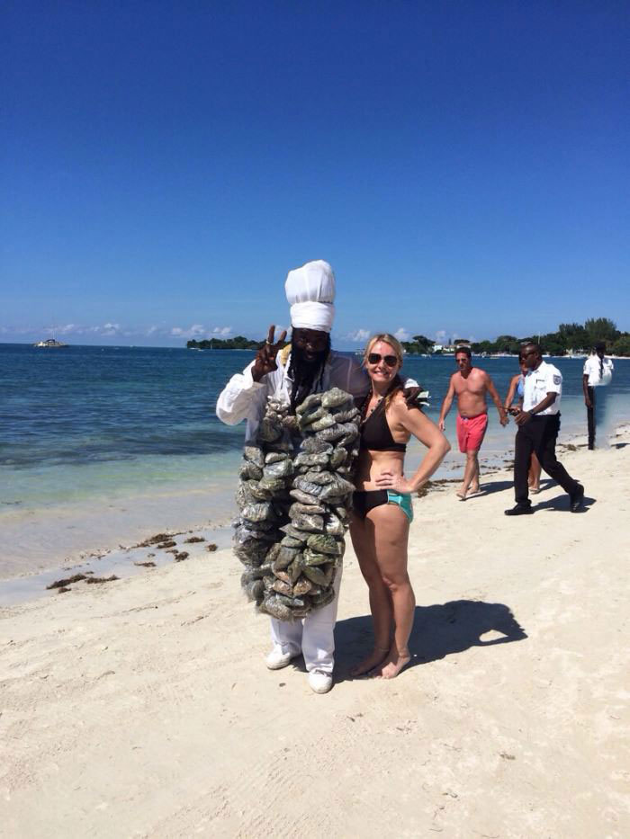 jamaican drug dealer on the beach, tons of bags of marijuana