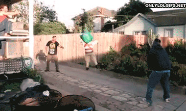 fat guy swings at a piñata and misses by a lot, fail, lol