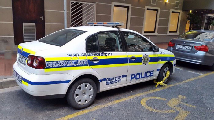 i guess there's no double standard after all, police car with a boot on it