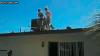 two girls jump off of roof into pool but one misses, ouch, fail
