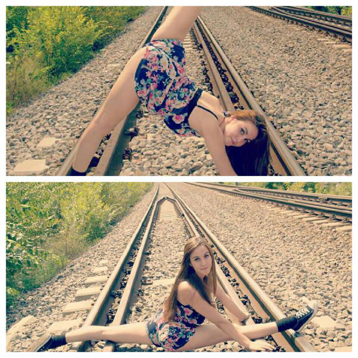 just think of the possibilities, girl displaying her flexibility on rail road tracks