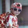 kid wearing pepperoni pizza clothes, shirt, hat, back pack