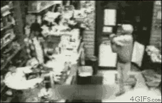 worst criminal ever throws gun at cashier then runs away, fail