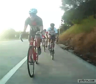cyclist gets something caught in his front wheel, ouch, wipe out