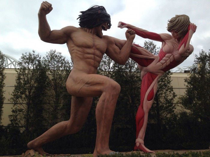 life sized sculpture of fighting characters, art