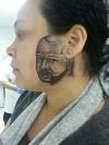 worst tattoo ever, face on the side of her face