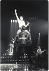 just a picture of freddie mercury on darth vader's shoulders during a queen concert