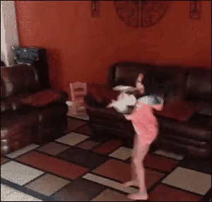 little girl gets dizzy with her cat, lol, rolling around