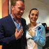 arnold schwarzenegger and katy perry wearing a left shark hoodie
