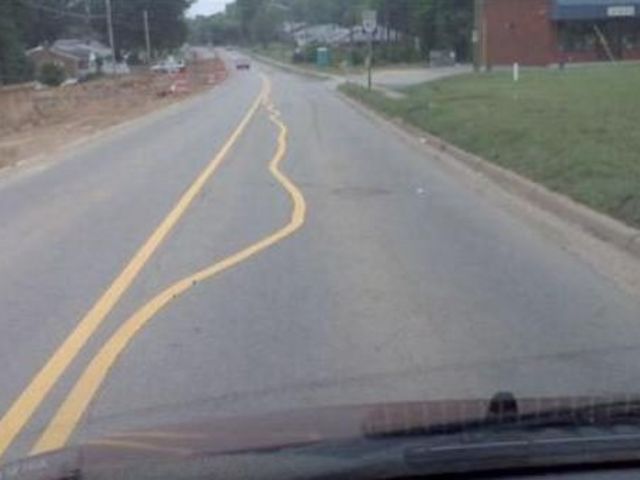you had one job, horrible road line paint job