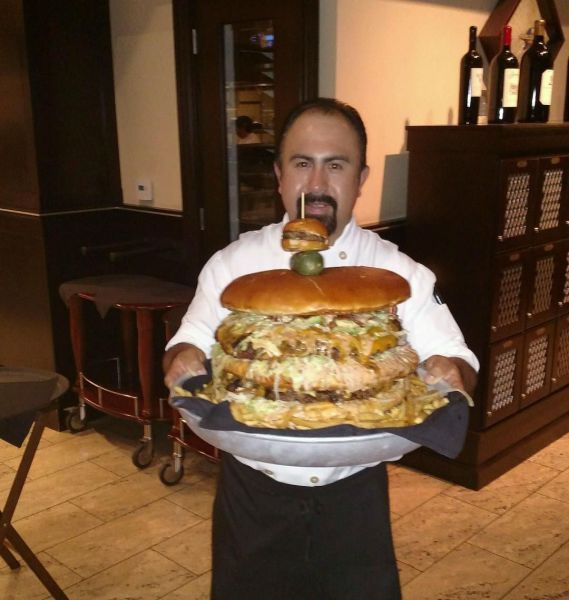 a burger so big it needs a smaller burger on a the toothpick