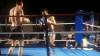 kick boxer knocks out opponent with spinning jump kick