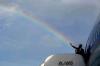 white house tweets picture of obama shooting rainbow from raised hand