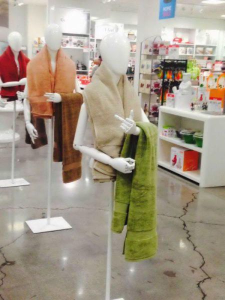 this mannequin is taking none of your shit, middle finger