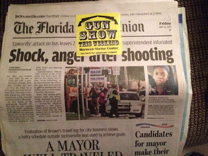 fun show sticker right over shocking front page shooting story