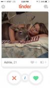 creepy tinder photo of girl with dead deer in bed
