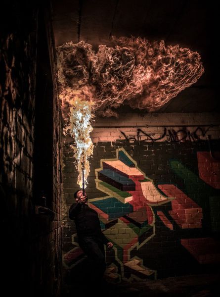 throwing flames near graffiti