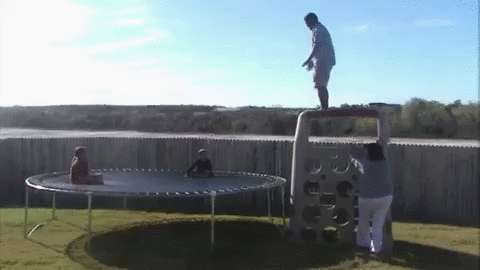 guy attempts to jump from playhouse to trampoline and breaks everything