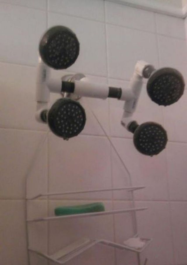 four headed shower head, it's ok i'm an engineer