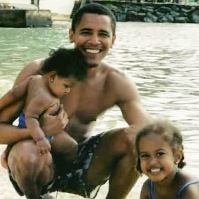 future president of the united states barack obama with his daughters sasha and malia
