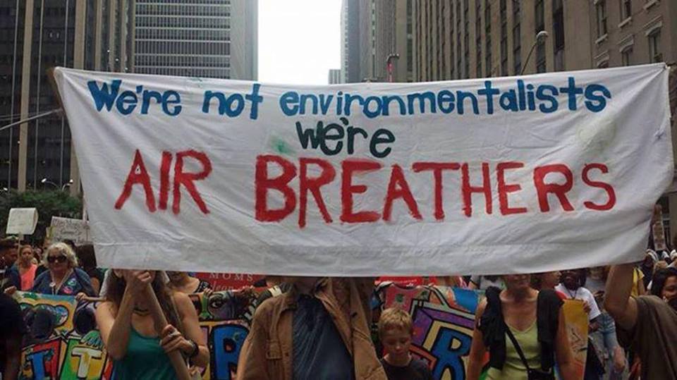 we're not environmentalists we're air breathers, protest sign