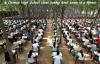 a chinese high school taking final exam in a forest