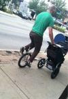 are you cool enough to go for a stroll with the baby on your unicycle