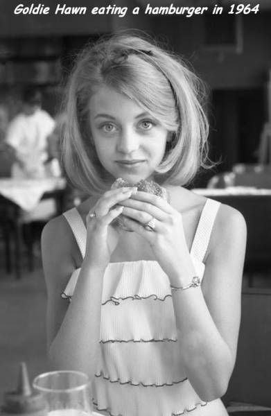 goldie hawn eating a hamburger in 1964