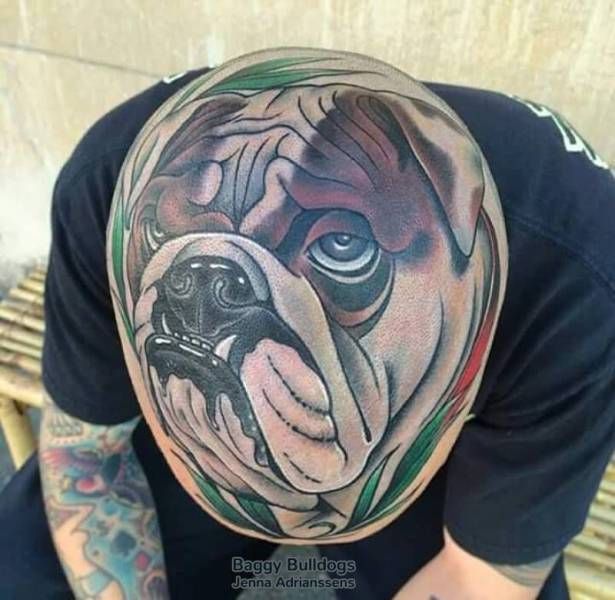 tattoo of bull dog face on top of head
