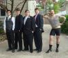 awkward prom photo, muscular guy in tight french getup, wtf