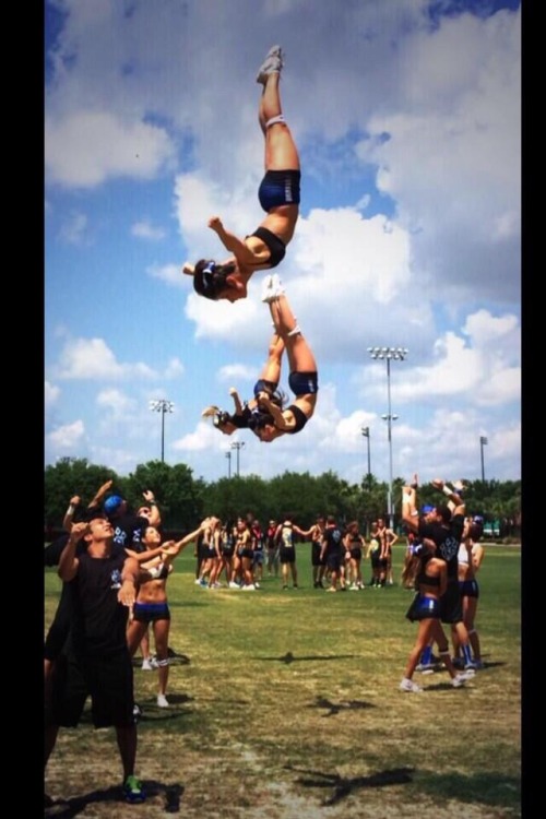 cheerleaders in mid air, who's going to catch them?