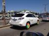 self driving google car with chrome rims