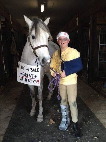 pony for sale, great with kids, kid with broken leg arm and head bandage standing next to a pony for sale