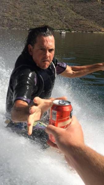 passing the beer while waterskiing, timing, action shot