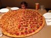 little girl giant pizza