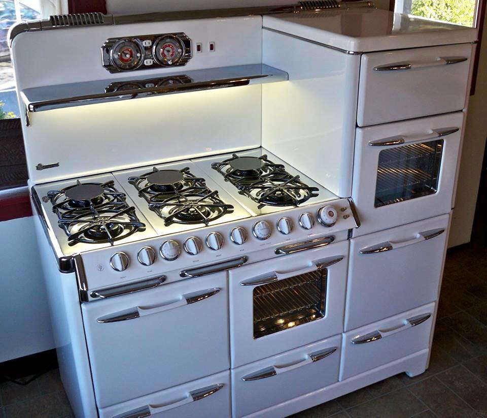 60" o'keefe & merritt antique gas stove chrome stove top 6 burners with simmers, warming oven, upper left side oven, left side broiler, center oven, right side grillevator broiler, epic oven