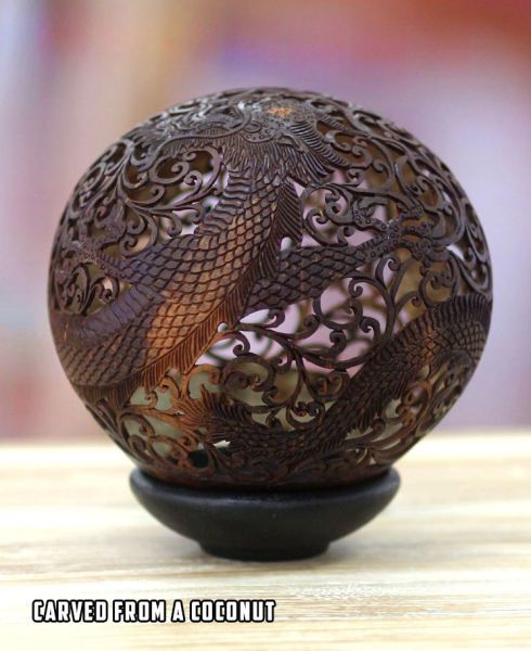 this awesome globe was carved from a coconut