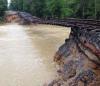 worst train tracks ever, river beneath tracks, landslide