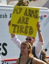 my arms are tired, funny protest sign