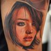realistic tattoo of girl shedding a tear, win
